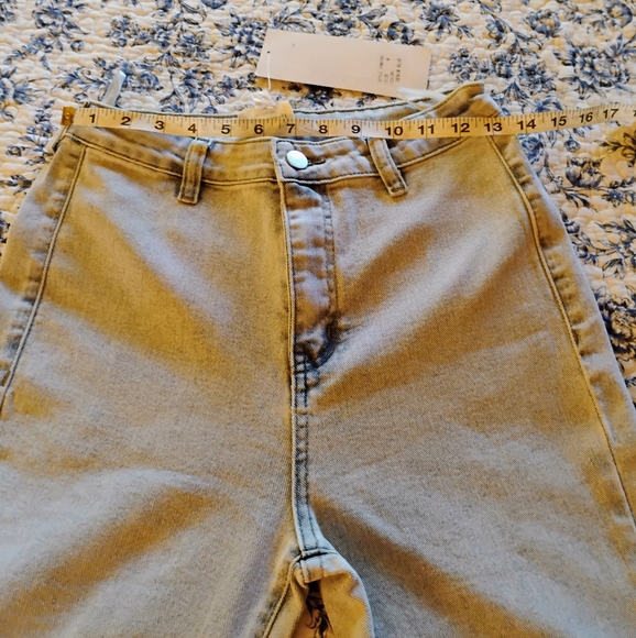 Eyelet bell bottom jeans - Picture 8 of 13
